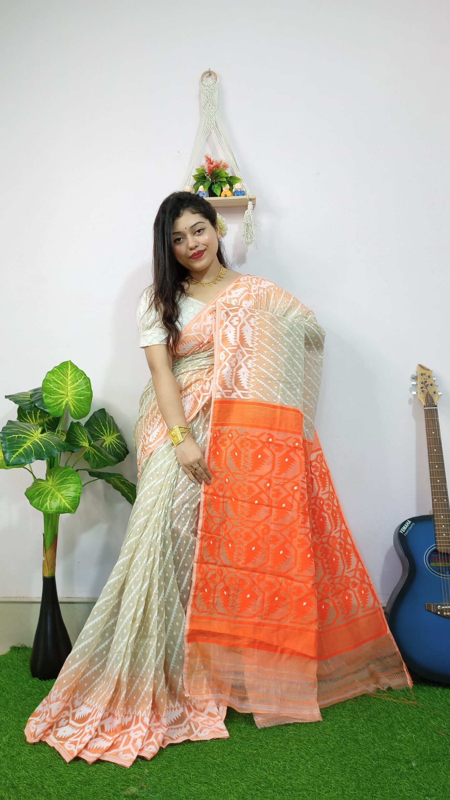 Exclusive Ikkat Cream Orange Jamdani Saree
